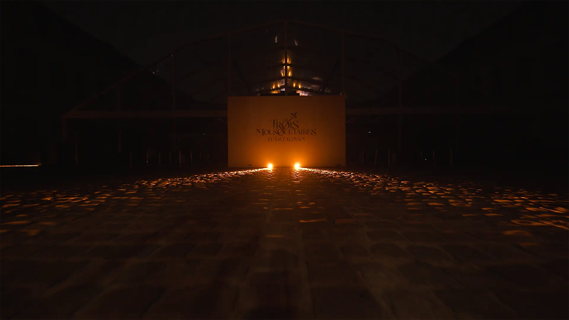 Outside the venue, dramatic stage design, at night, to present the movie key visuel