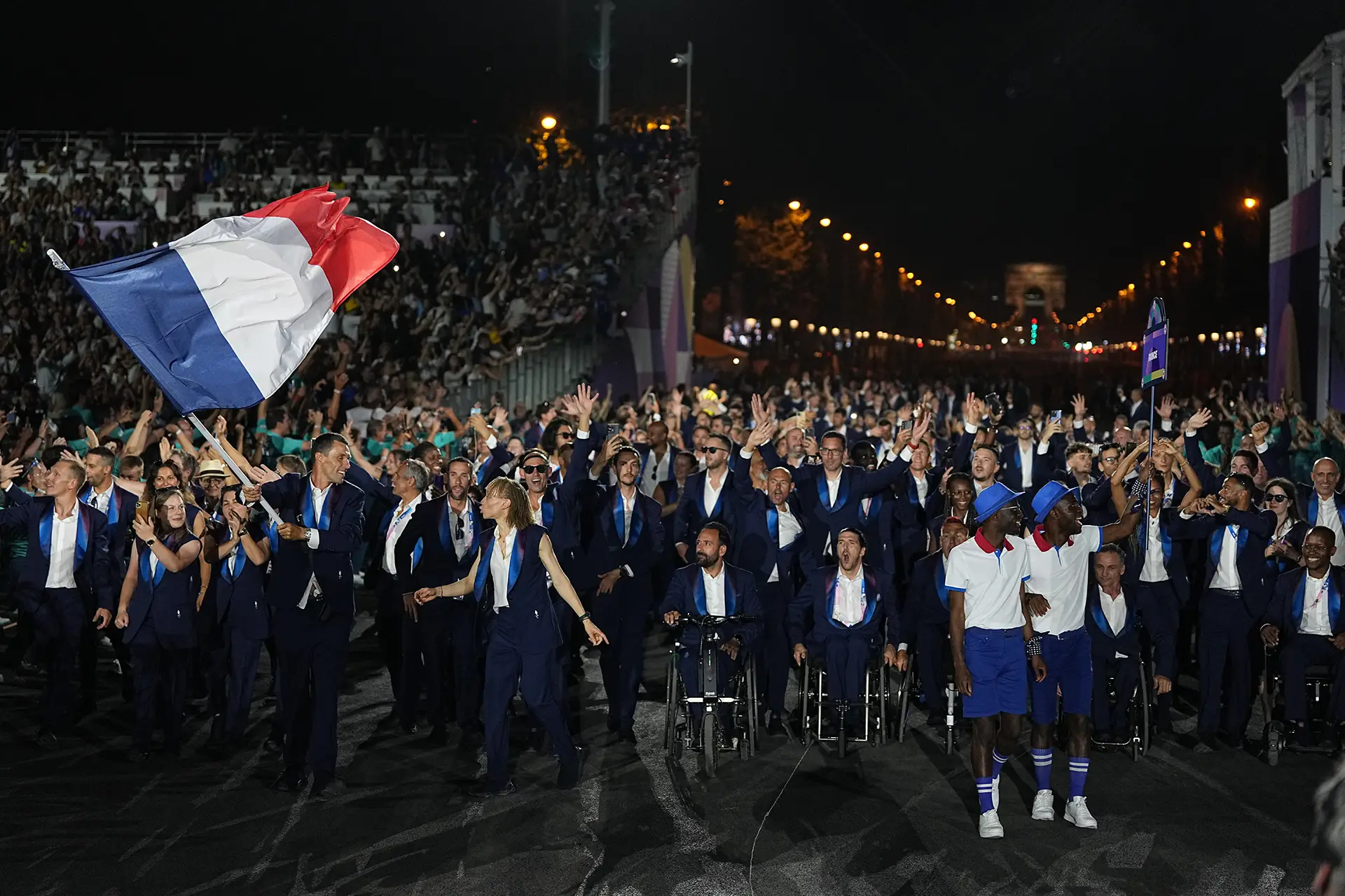 French paralympic delegation entering place de la Concorde