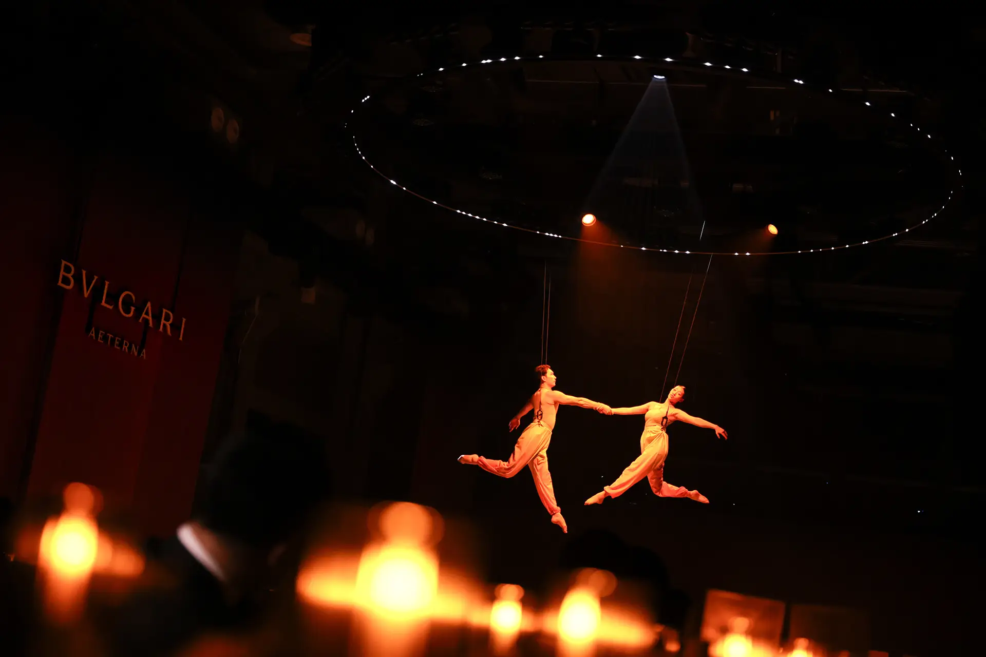 Acrobats performing during the High Jewelry event