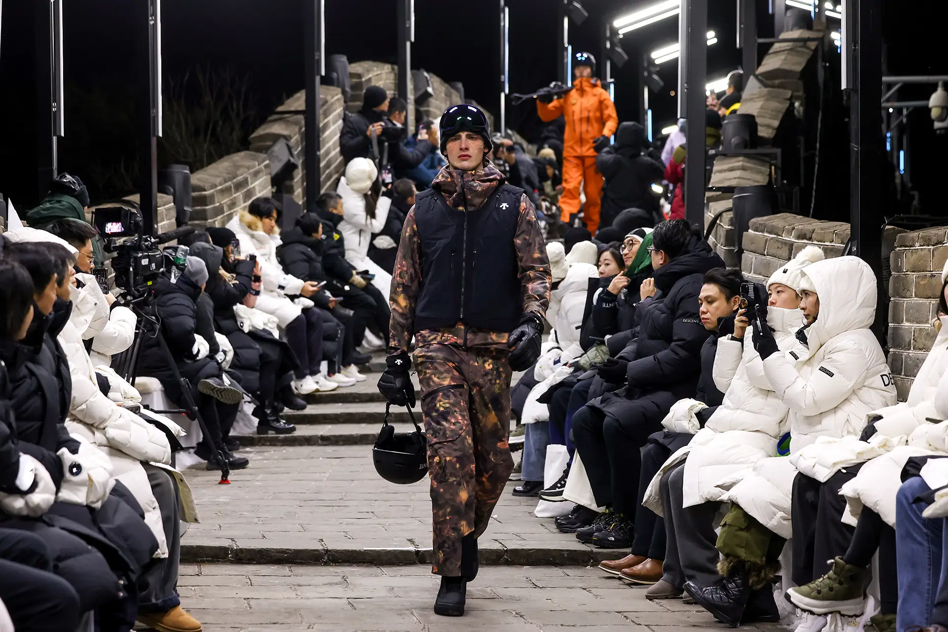 Male model on the runway wearing DESCENTE winter sportswear