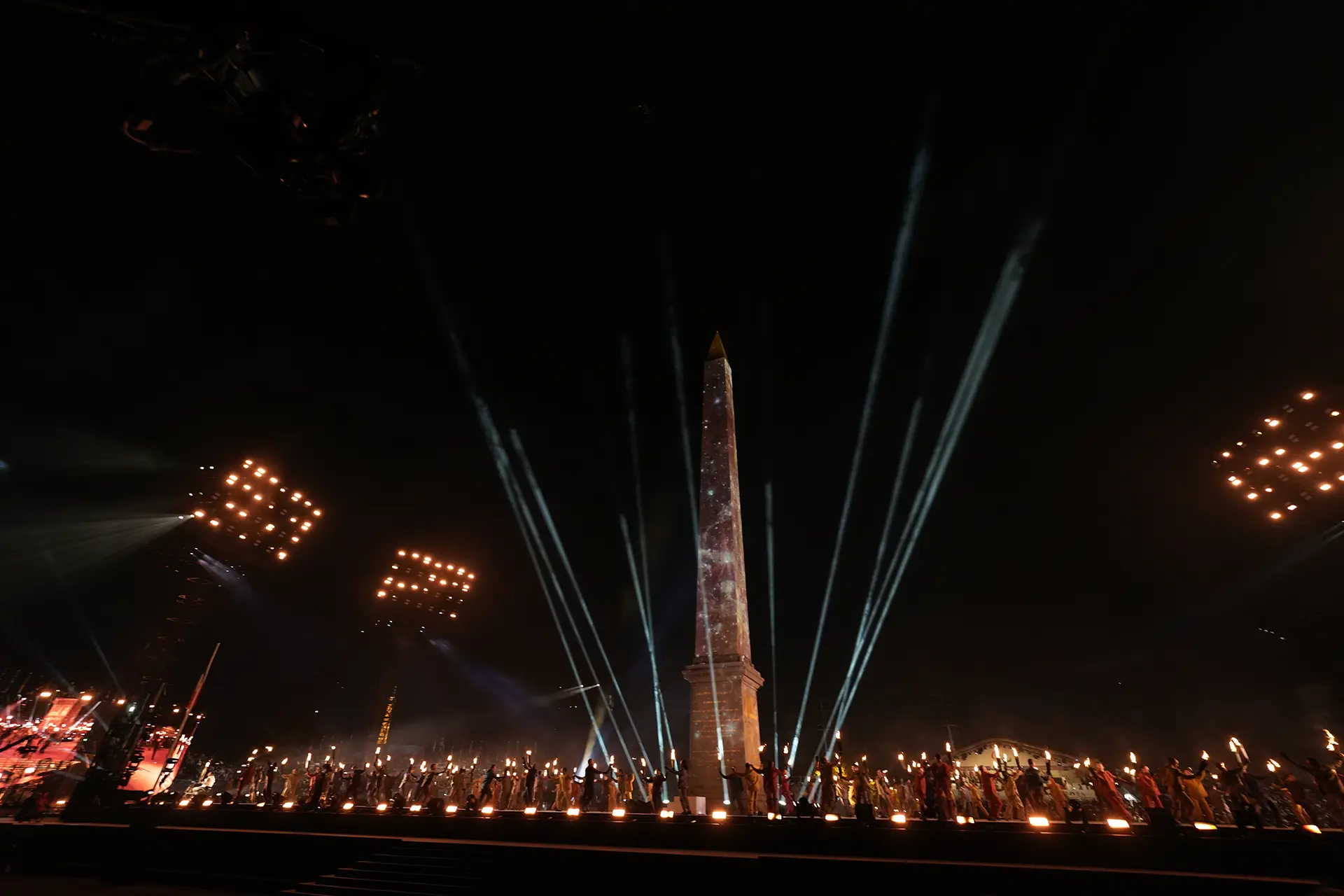 Lightning effects, performers hold fire torches