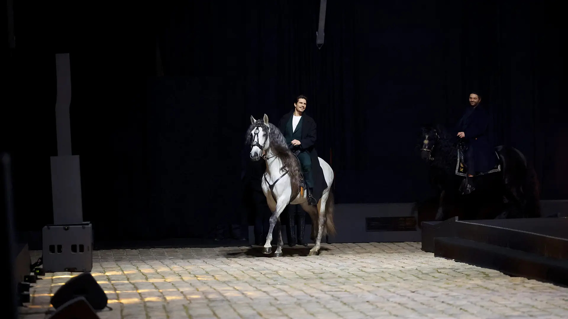 Cast members' entrance, riding their horse