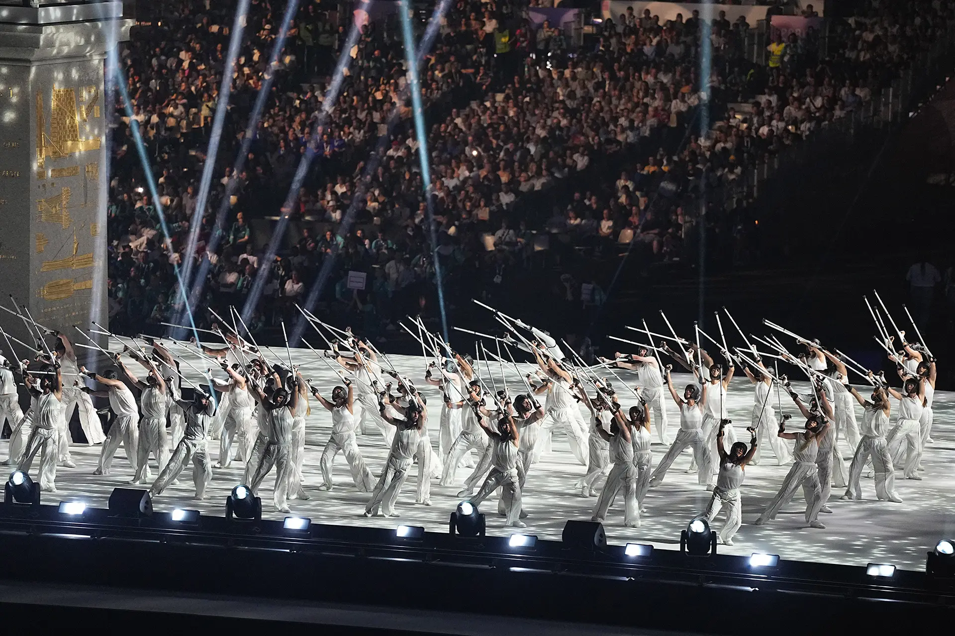 Performers dancing on crutches