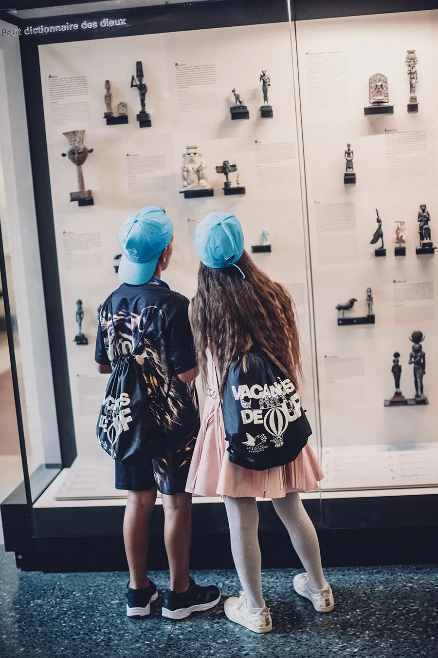 Children taking part in an antic art exhibition in the Louvre
